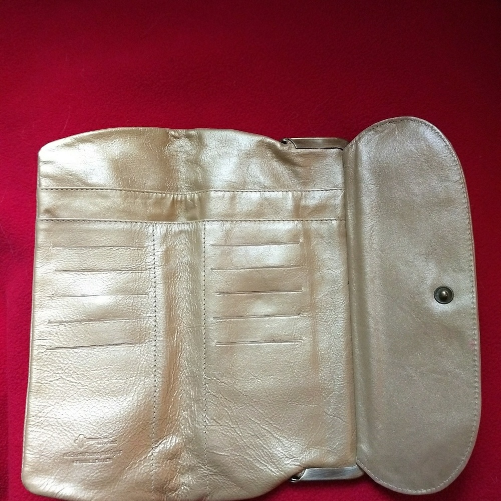 Michael Rome designs leathe fold out wallet/clutch
